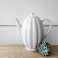Stoneware Teapot 900ml — photo by Natalia Ventskovskaya on Unsplash