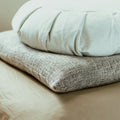 Washed Linen Cushion Cover — photo by Kier in Sight Archives on Unsplash