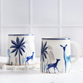 Stoneware Mug Pair — photo by Kairaus Official on Unsplash